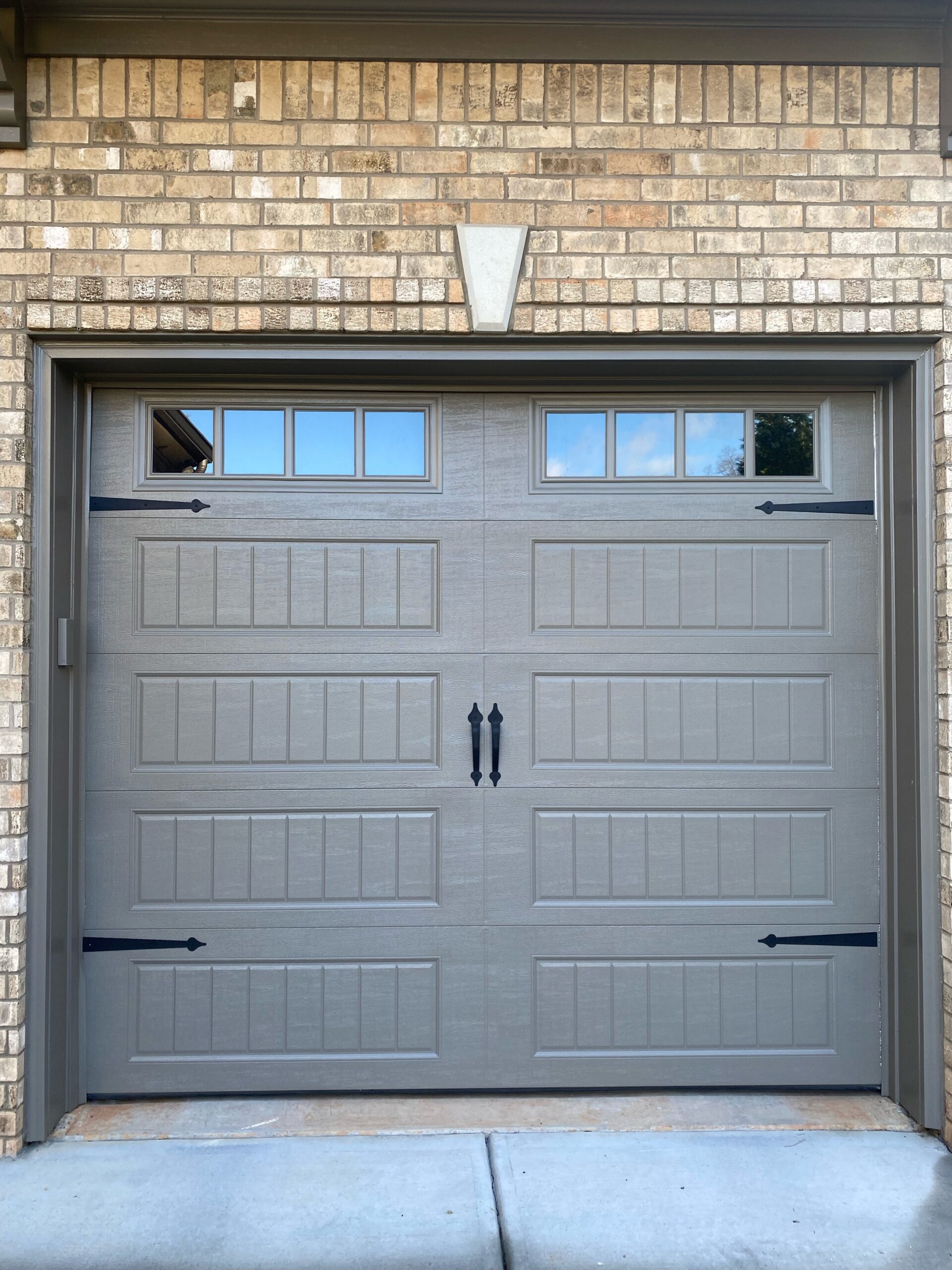 Stamp steel carriage house installation