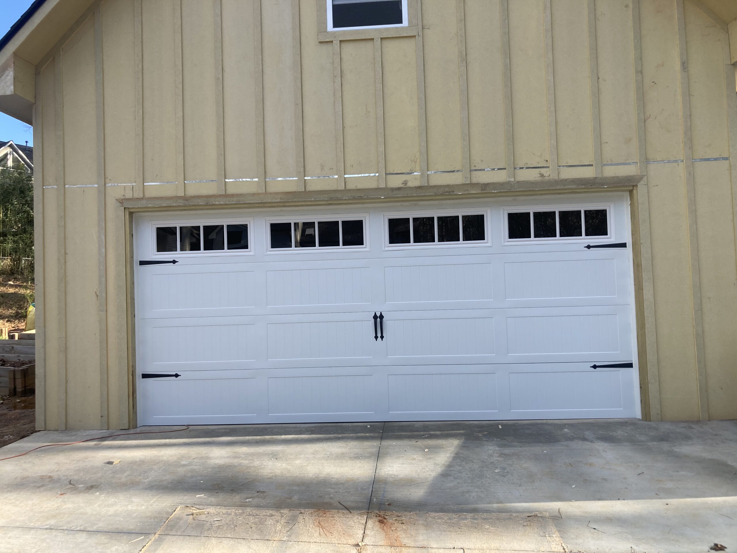 Stamp steel carriage house door