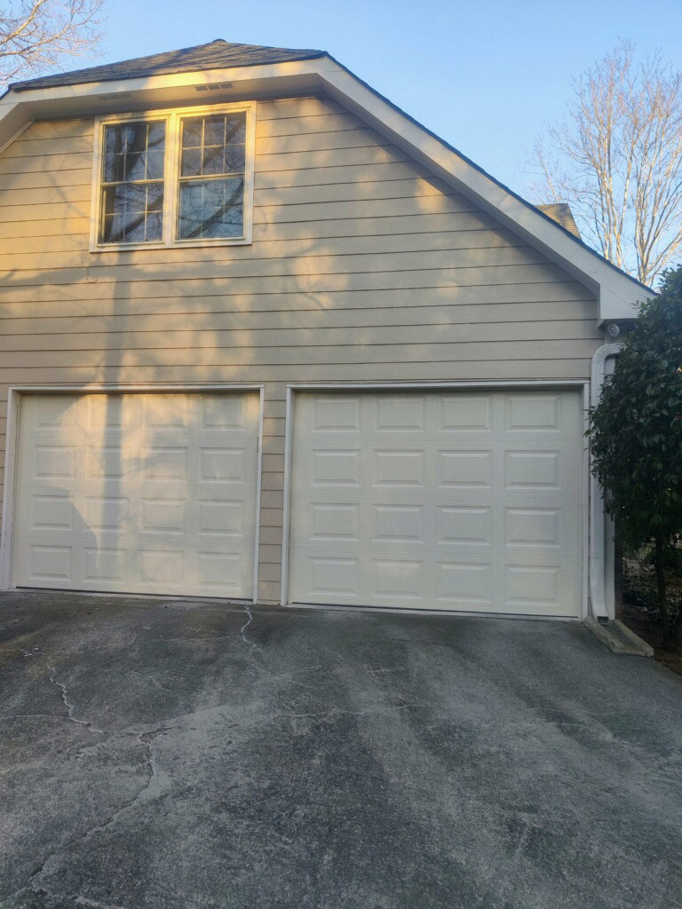 Beige raised panel garage doors