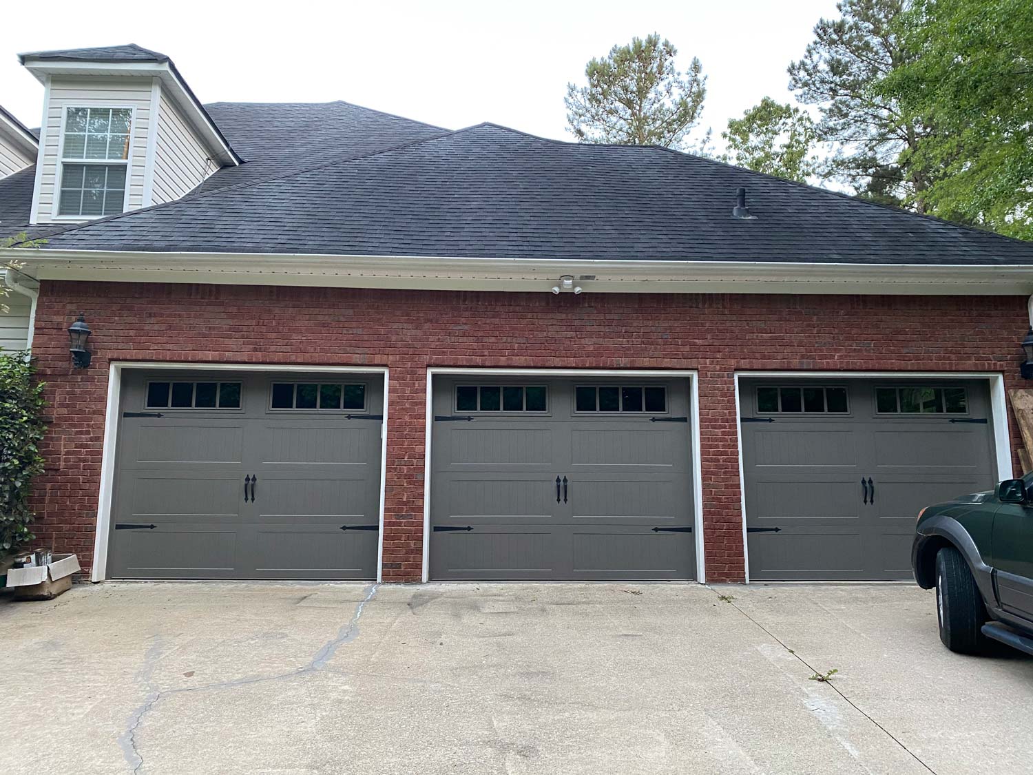 Gray stamp steel carriage house doors