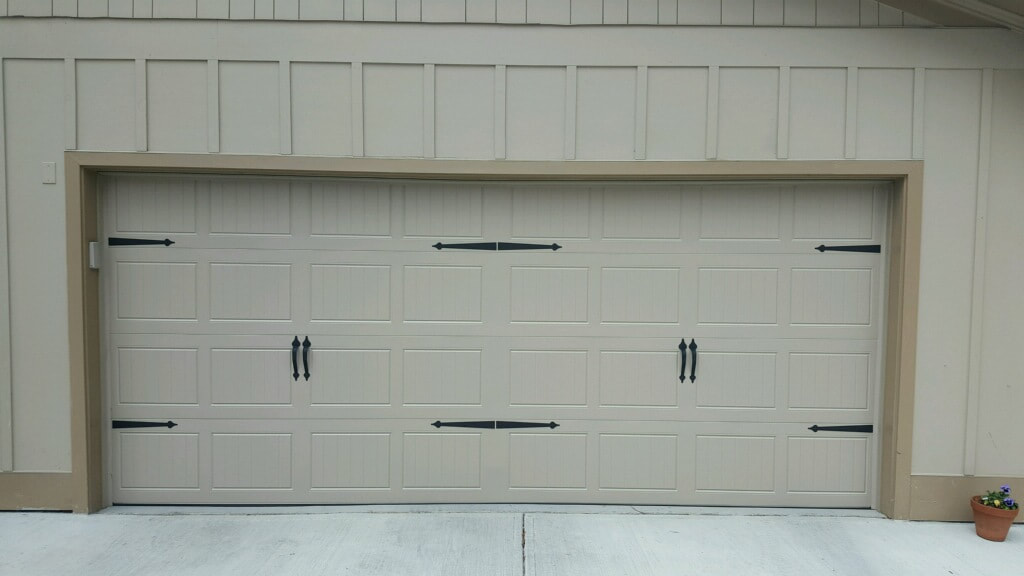 Stamp steel carriage house door
