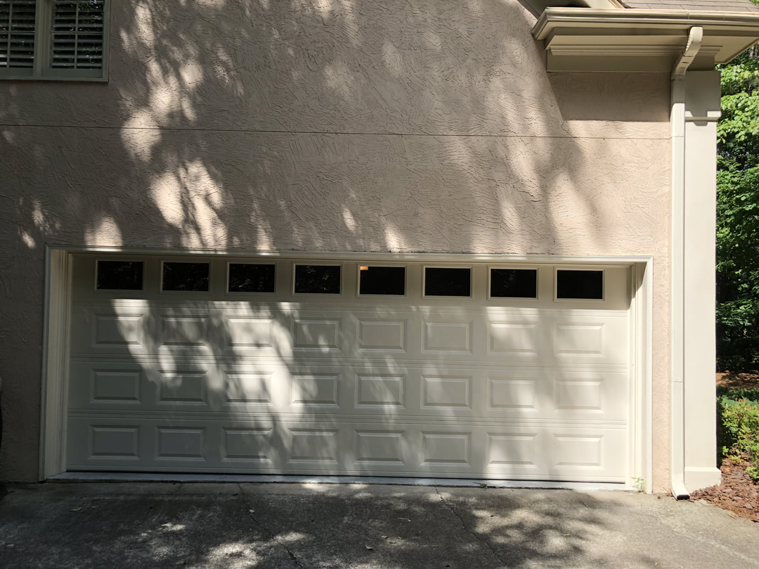Raised panel garage door installation