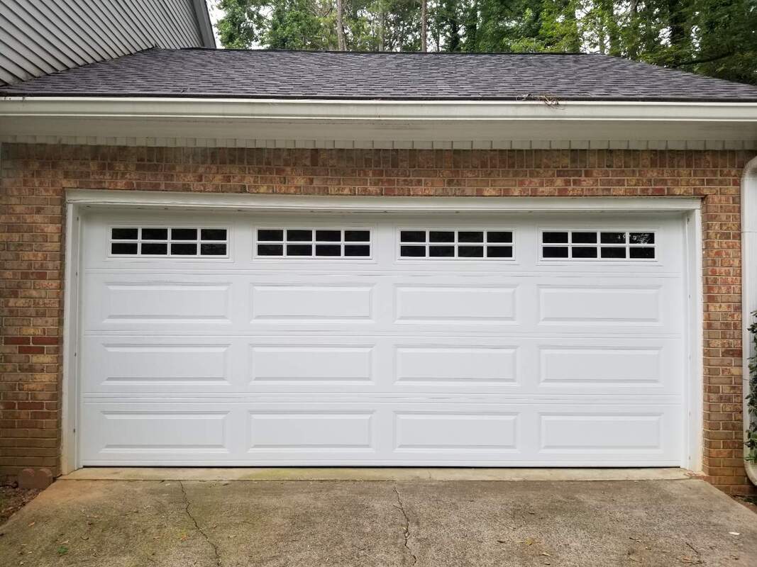 Raised panel garage door installation